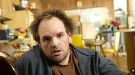 Ethan Suplee in a black jacket poses for a picture.